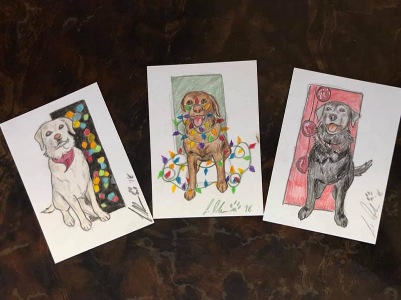 set of three small art cards of three labs each in a christmas setting