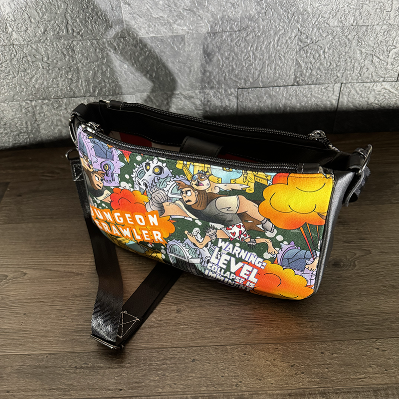 a handmade bag featuring cartoon images of a popular book character and his cat