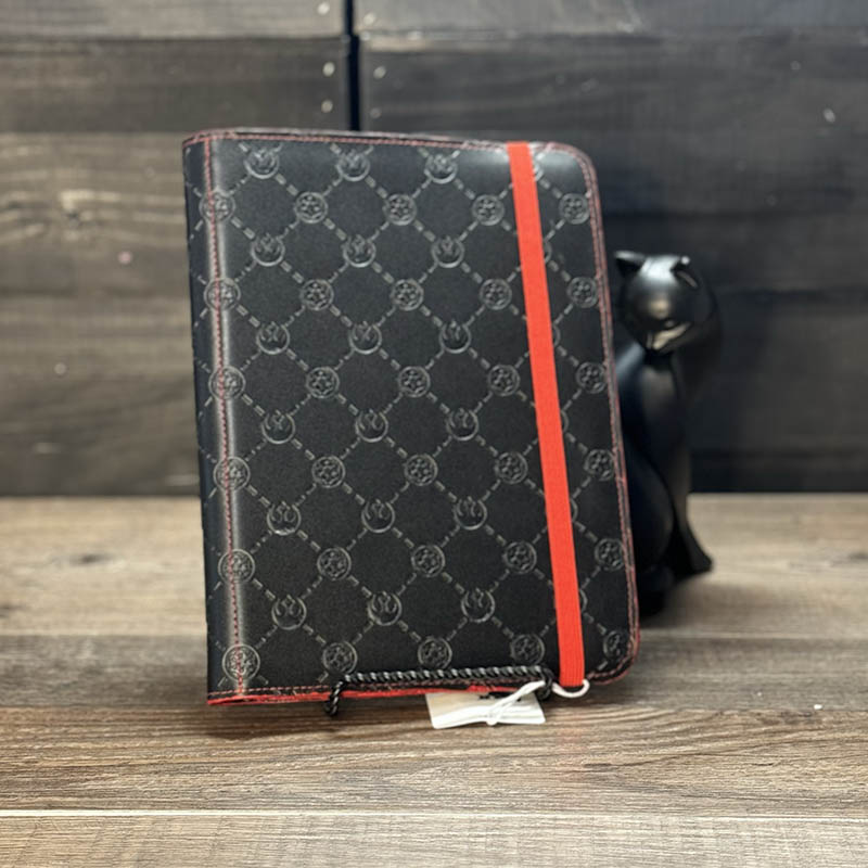 notepad holder featuring a black embossed design