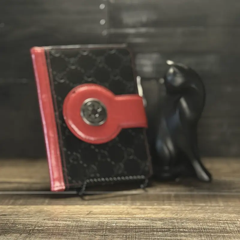 an ebook cover with embossed green vinyl and a leaf magned closure