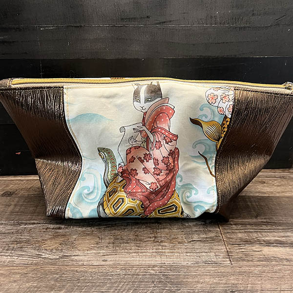 handmade cosmetics bag with brown vinyl and a painterly cats design