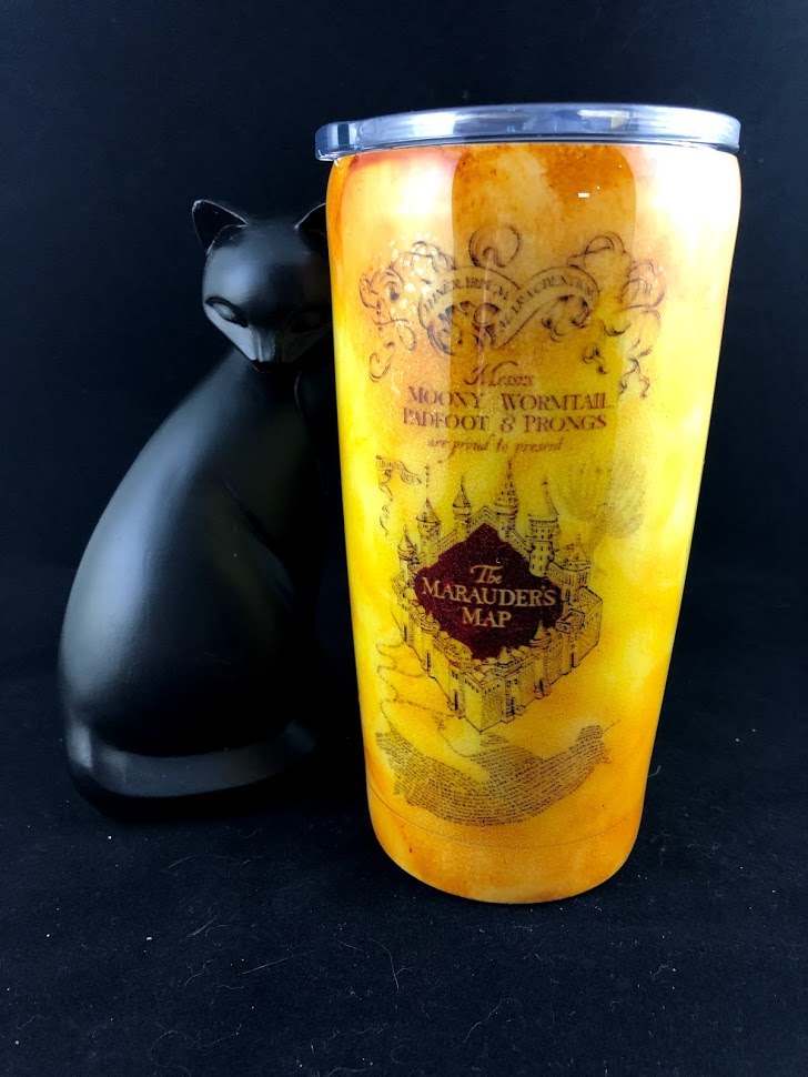 decorated tumbler made to look like the Marauders map from Harry Potter